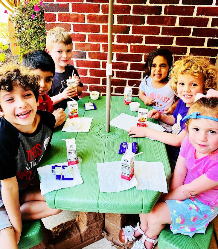 Group of kids enjoying a snack